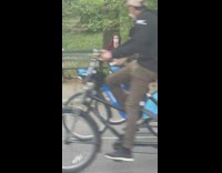 Woman Poses with Mannequin with No Legs 