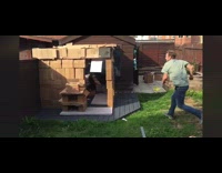 Man jump into box play house slow motion