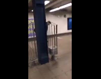 newspaper on fire man puts it out