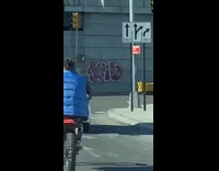 Guy in car trunk films dirt bikes