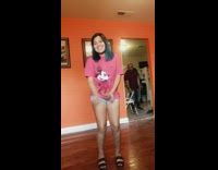 Little girl pink mickey mouse shirt dancing dad unamused