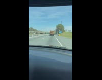 Woman gets mad at younger sister for driving behind truck 