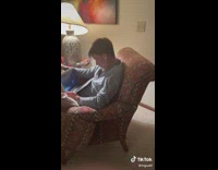 Guy spits ping pong ball at dad on head 