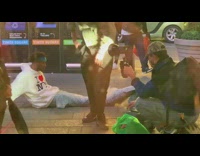 Guy wear mermaid suit on photoshoot along street at night