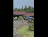 3 girls dance near car in Hawaii 