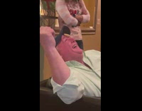 Guy moves cookie on forehead to mouth 