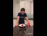 Guy inhales jello in one bite