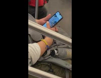 Grey sweater guy squirrel video phone subway 