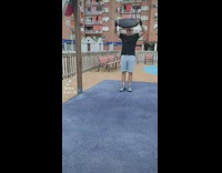 Guy leaps over swing into plank
