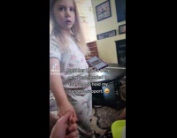 Lady Holds Kids Hand as she Farts