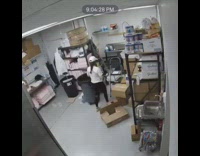 Girl slips and falls in backroom at work, coworker laughs, security footage