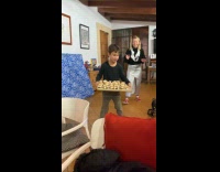 Boy serves dessert using hoverboard falls down