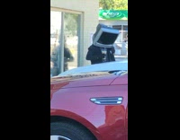 Television over head guy dances iced coffee 
