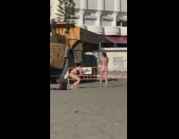 Girl pink bikini beach large construction truck