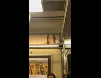 Fake lashes put on a poster of a woman 
