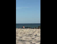 Girl jump shot high five kiss beach