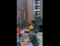 Man balancing on giraffe unicycle