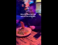 Salmon served vertically on plate 