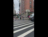 Cowboy hat guy trump head stick crosswalk 
