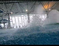 guy does side canon ball into indoor pool