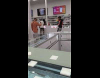 Guy rapping in weed shop