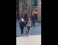 Collab PubityPets - Couple with pet dog ride in backpack