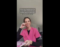 Woman pink scrubs shirt showing laptop computer xrays