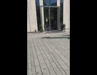 Blonde girl walk hold black paper bag