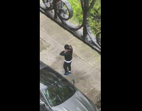 Guy dances bumps elbows with stranger sidewalk 