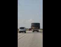 Truck carry two large tires oversize load