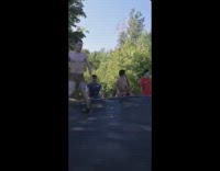 Brown shorts guy trampoline front flip lake 