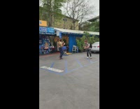 Guy dances and eats taco parking lot 