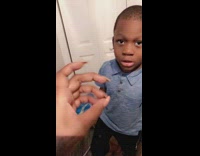 Kid Misinterprets Hand Letter Sign from Lady