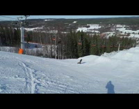 Skier does backflip off ramp and fails, lands on knees