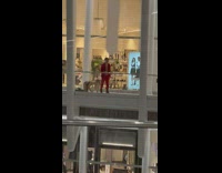 Man pull a woman inside mall in NYC 