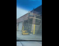 Forklift carries up ladder 
