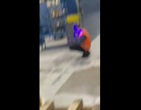 Man worker vest crouch violet light selfie