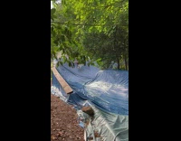 Guy going down waterslide does barrel roll 