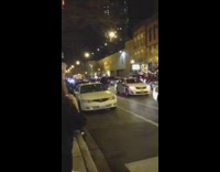 Guy rides bicycle ring hoop does flip