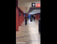 Man brown suit dance walk at subway