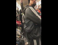 People on subway singing song together