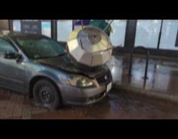 Satellite crashed at car hood on street