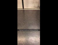 Small bag of cocaine on the floor under subway train seats