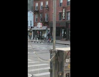 Person wears backpack and stilt bounce shoes 