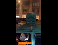 Man drives customized beetle with Halloween decorations