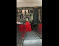 Guy wears thor costume with cape and hammer 