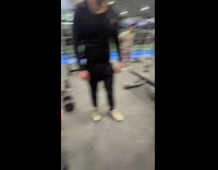 Mat at gym rolling on top of dumbbell 