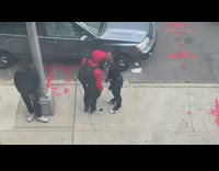 Woman gets in mans face red sweater and yells at him in public on sidewalk