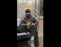 Black jacket guy clips nails on subway 