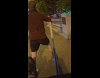 Rickshaw working jumping while pulling couple 